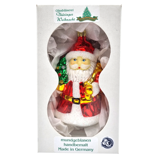 Weihnachtsmann mit Baum und Sack